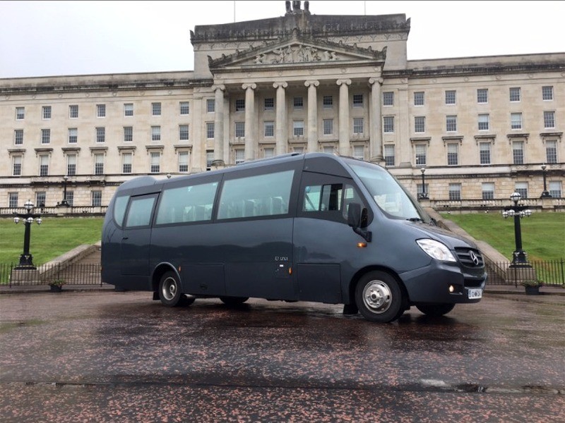 Curran Minibus outside Stormont Castle, Northern Ireland - we have a large fleet of coaches & buses for hire for tours throughout Ireland