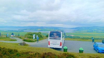 Curran Coaches group visiting An Grianán of Aileach, County Donegal, Ireland